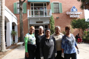 Photo of five volunteers