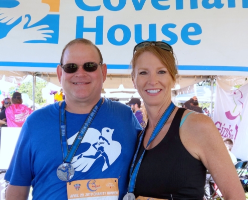 charity runners for team covenant house at the post-race fest