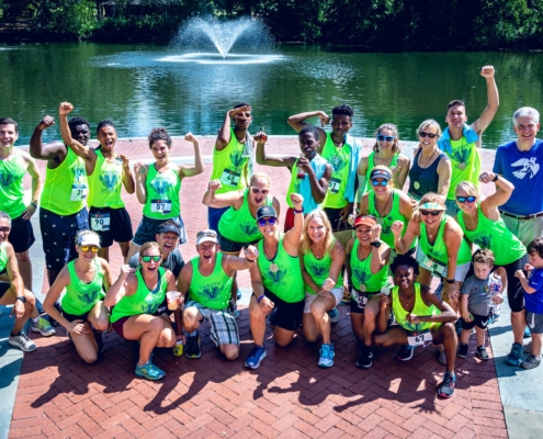 Group photo of track club team after the 2019 Arts & Hearts 5k