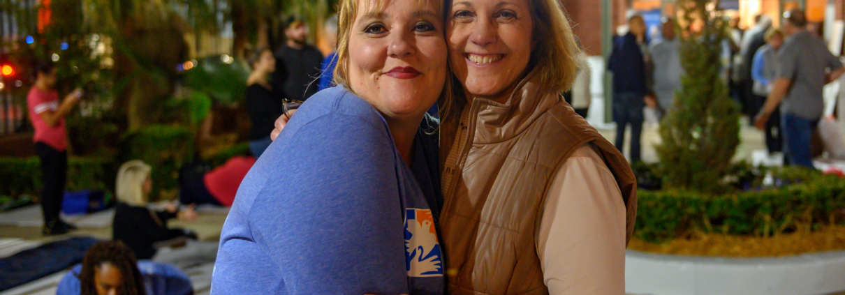 Two women smiling during Sleep Out 2020