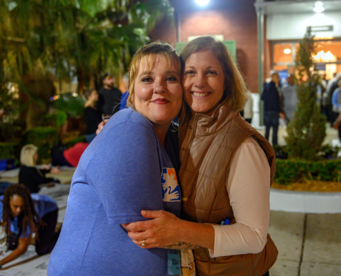 Two women smiling during Sleep Out 2020