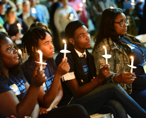 Covenant House youth holding candles during Sleep Out 2020