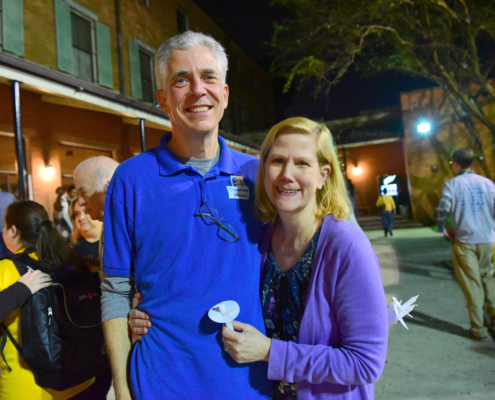 Jim Kelly posing outside the Covenant house at night